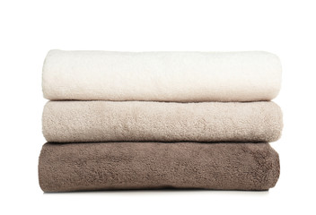 Fototapeta na wymiar Folded soft terry towels on white background