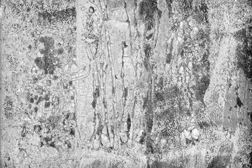 Black and white gray old cracked rusty damaged painted metal background texture close-up