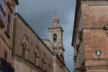 square with a view of the church bell tower