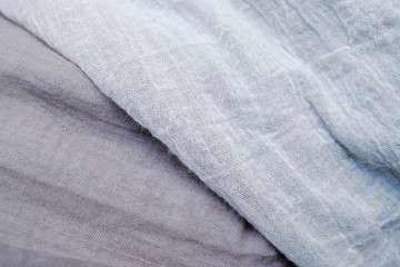 Fototapeta na wymiar Crumpled fabric beige texture