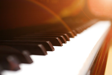 Close-up of a grand piano keyboard, very shallow DOF!