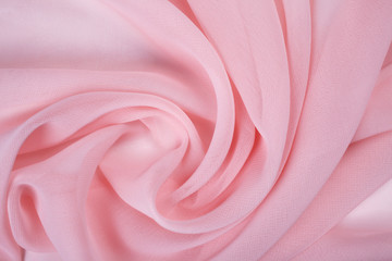 Obraz premium Crumpled fabric pink texture