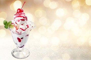 Berry ice cream in glass bowl on white background