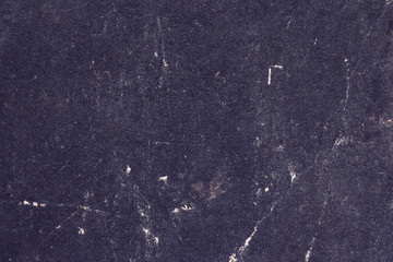 Dark purple shabby paper surface. 