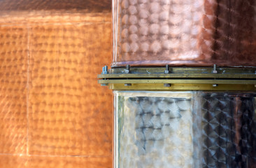 Detail of distiller wall in copper and steel