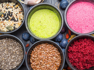 Various colorful superfood powders, cleasing and detox concept