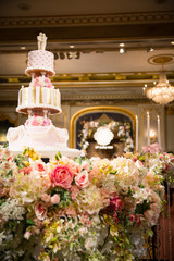 Wedding cake and candle with flower decorate