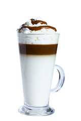 Coffee macchiato with whipped cream and caramel in a glass mug. Isolated object on white background. The photo.