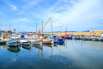 Fototapeta na wymiar Boats in a port of Saint Tropez, France