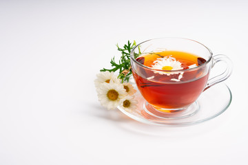 cup of tea with chamomile flowers