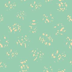 Variety of soft yellow paint spatters in random layout. Sunny seamless vector pattern on light turquoise background. Great for wellness, beauty, beach products, stationery, fabric, packaging, giftwrap