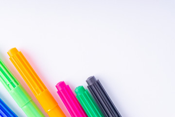 Closeup color pencils isolated on white background with selective focus and crop fragment. Back to school and Education Concept.