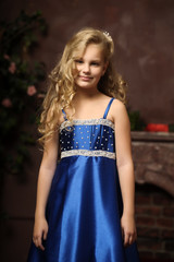 blonde in a blue Victorian dress