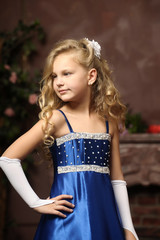 blonde in a blue Victorian dress