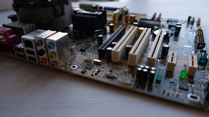 part of the motherboard with broken condensers