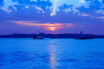 Istanbul, Turkey, 10 June 2007: City lines ferry, Sunset at Kadikoy