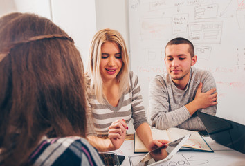 Adult people sitting in the office