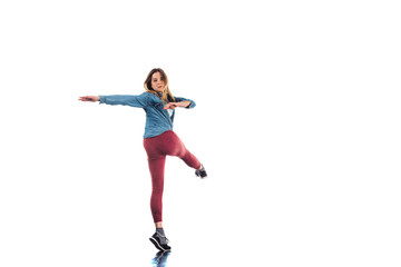 Fototapeta na wymiar Woman showing aerobic moves