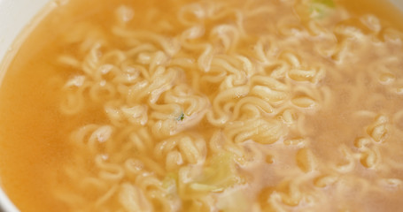 Instant noodles in soup bowl
