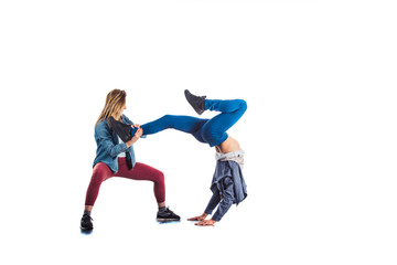Two people exercisie gymnastics