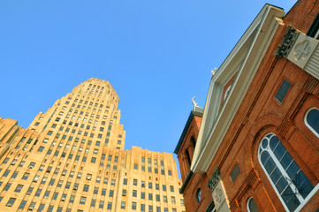 Buffalo City Hall and St Anthony's of Padua RC Church in downtown Buffalo, New York, USA.