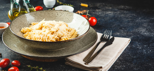 Cooked fusilli pasta in plate