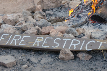 Fire Restriction Sign on Camp Fire