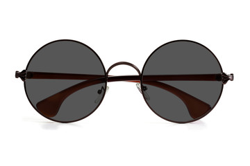 Stylish unisex round-shaped sunglasses on a white background. Front view.