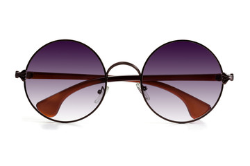 Stylish unisex round-shaped sunglasses on a white background. Front view.