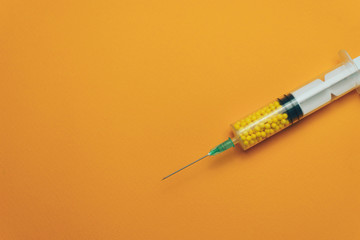 Syringe with color drugs ( vitamins, dyes, flavor enhancers, nutritional supplements, innovative...