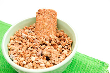 crispy muesli dry Breakfast in a bowl isolated on white background selective focus, top view