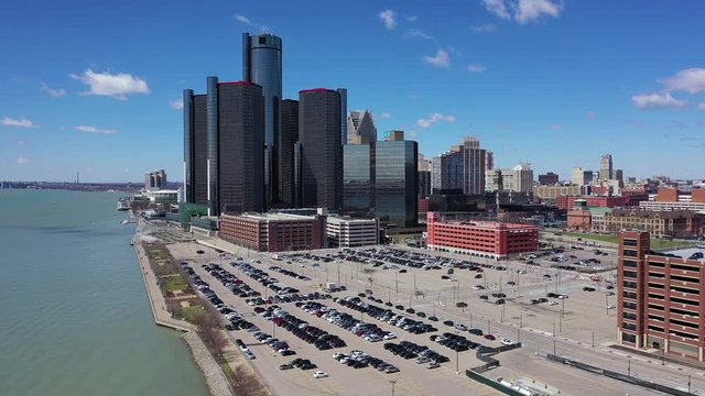 A Fantastic Aerial View of the Detroit Renaissance Center Slowly Descending Down to Street Level on a Beautiful Day