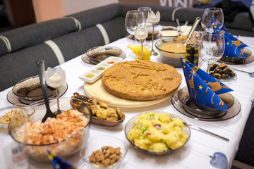 Homemade christmas bread. Balkan kitchen - homemade bread with a christian cross and christian symbols on it for the Christmas Eve.
