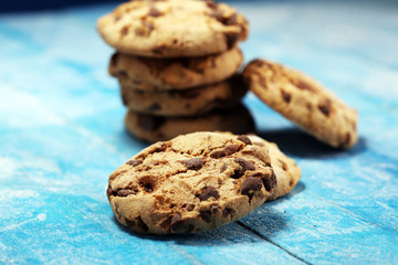Chocolate cookies on wooden table. Chocolate chip cookies