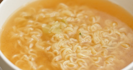 Instant noodles in soup bowl