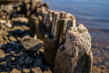 Old historical river reinforcement isolated with a blurred background