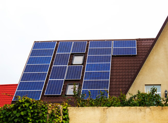 Solar panel on a roof of a house concept of save resources