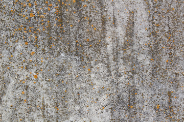 Grey old grunge wall of a house, urban background