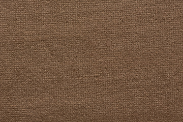 Fototapeta na wymiar Saturated deep brown textile background.