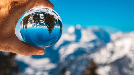 Crystal ball alpine winter landscape shot at the famous Steinplatte-Waidring-Tyrol-Austria