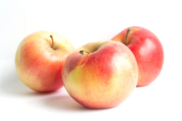 red apples on white background