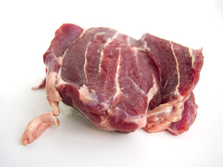 raw red meat on white background
