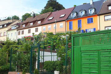 Traditional old German townhouses with gardens in front (Breisach, South Germany)