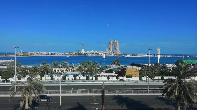 Airplane race show in Abu Dhabi corniche street - Abu Dhabi city famous landmarks: Marina Mall, Marina eye wheel, Fairmont Marina