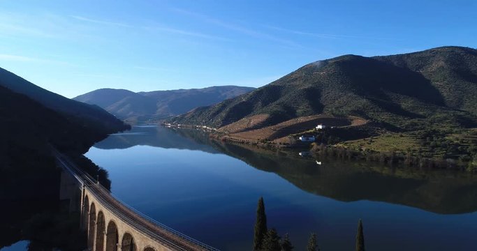 Aerial view of the terraced vineyards in the Douro Valley and river near the village of Foz Coa, Portugal; Concept for travel in Portugal and most beautiful places in Portugal