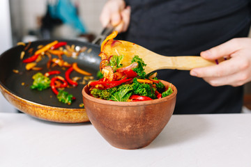Cooking vegetables salad. Chef hands. Making process. Vegan. Raw. Healthy food. Organic.