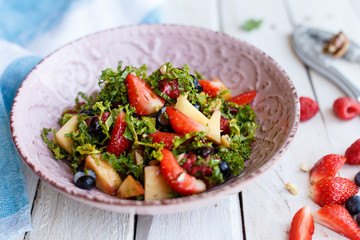 Salad with berries and cheese. Strawberry. Nuts. Honey. Blueberry. Homemade. Diet. Organic. Dish.