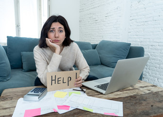 Stressed and overwhelmed young woman accounting home finances paying bills asking for help