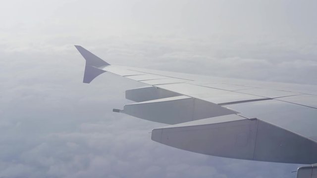 Aerial view of cloudy sky from airplane windows