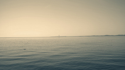 People by the ocean bed - Clear sky - Norway